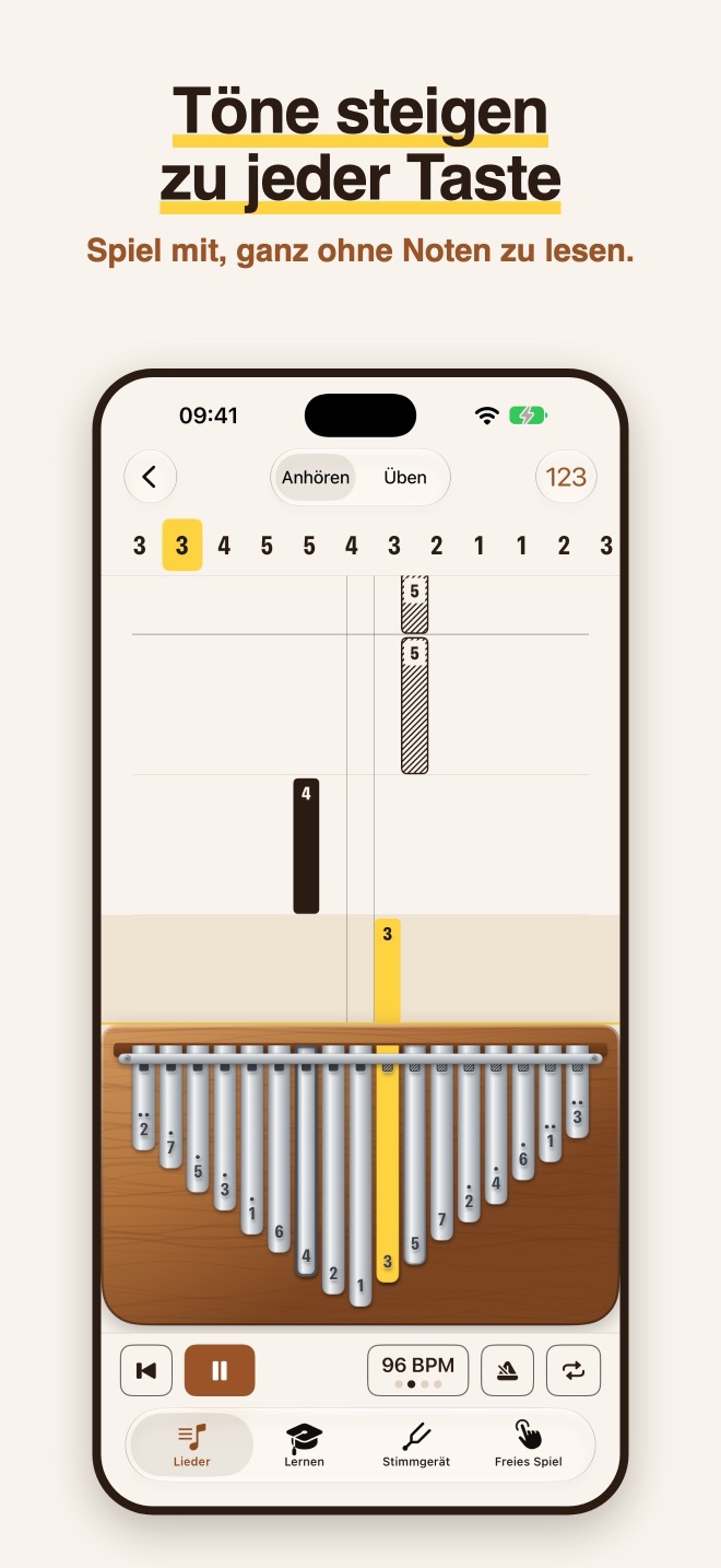 Kalimba Coach in German: the Listen screen with Anhören and Üben modes, note bars falling onto a wooden kalimba, and tabs labelled Lieder, Lernen, Stimmgerät and Freies Spiel
