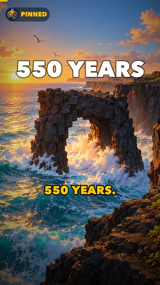 A sea arch at sunset with the words 550 years